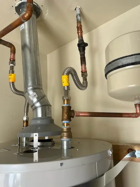 Water heater installation and plumbing repair in Downtown Manchester